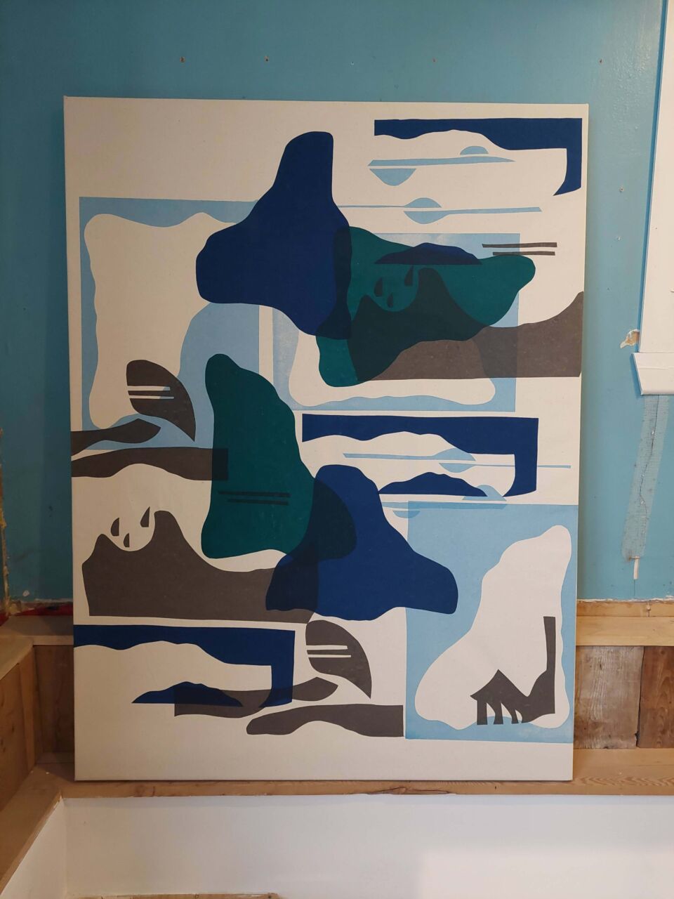 Œuvre encadrée aux formes abstraites bleu marine et beige, par Florence Hupin